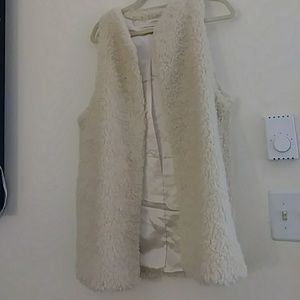 Cream or white faux fur vest